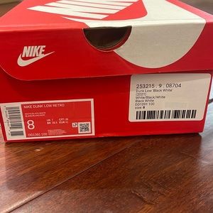 Nike Dunk Low Retro, Black/White Men’s Size 8.  Brand new in box, never worn